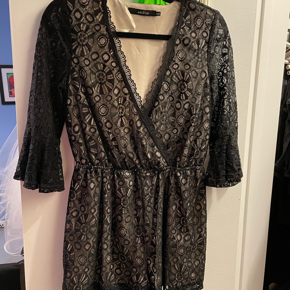 Girls black eyelet/lace romper for teens.